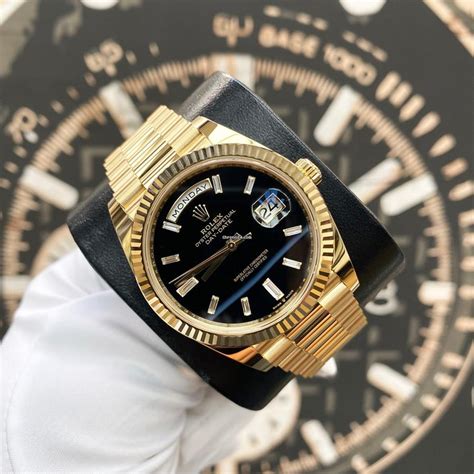 rolex day date black dial baguette